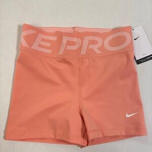 Nike Pro Women's Athletic Shorts - Coral and White